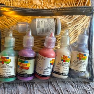 Set of 6 3D fabric paint unopened in clear carrying bag.